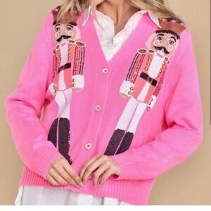 Stunning Nutcracker QUEEN OF SPARKLES pink button up sweater.